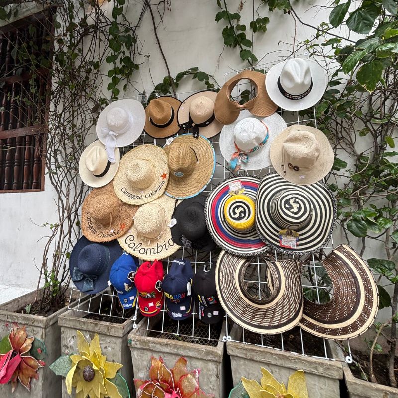 Display of traditional Colombian hats and souvenirs outside a shop in Cartagena’s historic center.