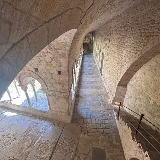 Historic stone staircase inside Girona Cathedral