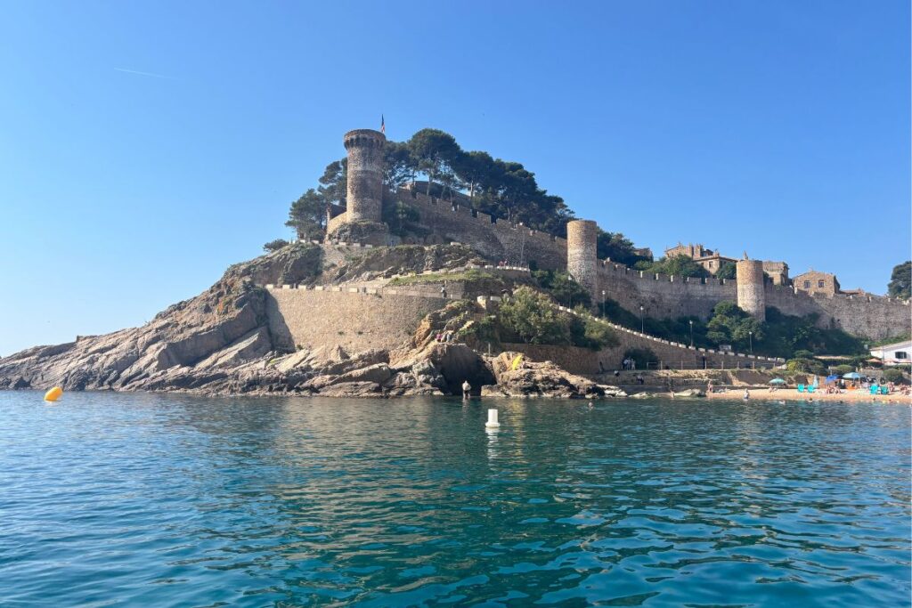 View of Vila Vella fortress and the medieval walls of Tossa de Mar from the sea