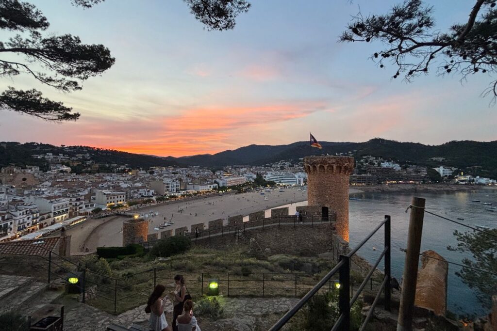 Sunset view over Tossa de Mar beach and Vila Vella fortress on the Costa Brava