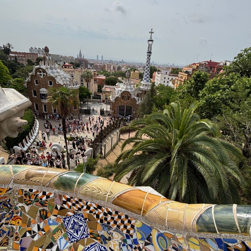 View from Park Güell overlooking Barcelona and its iconic mosaic architecture