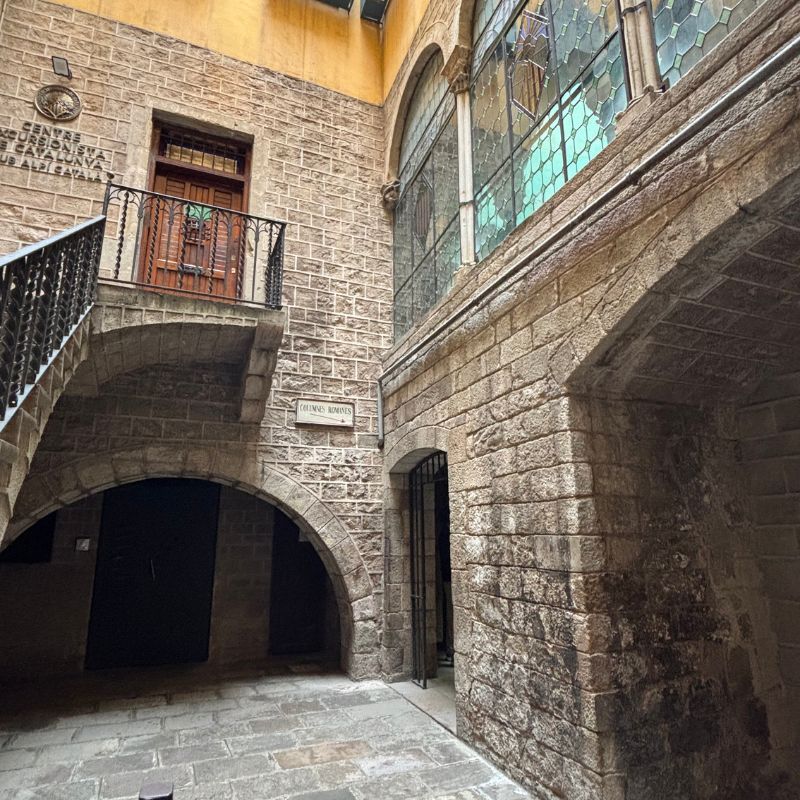 Stone courtyard and medieval architecture in Barcelona's Gothic Quarter