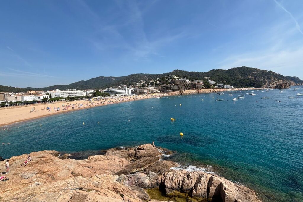 View of Platja Gran beach and the coastline of Tossa de Mar on Spain's Costa Brava