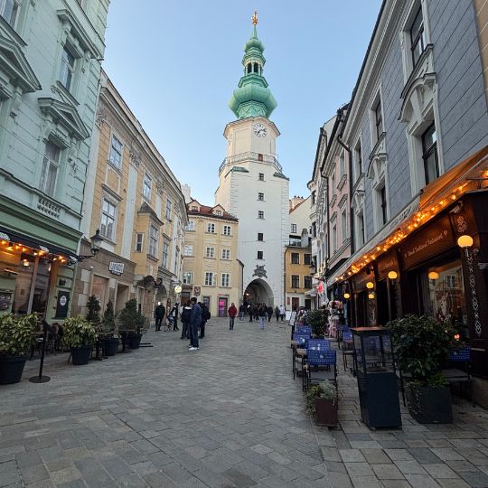 Michael's Gate rising above a pedestrian street in Bratislava's Old Town