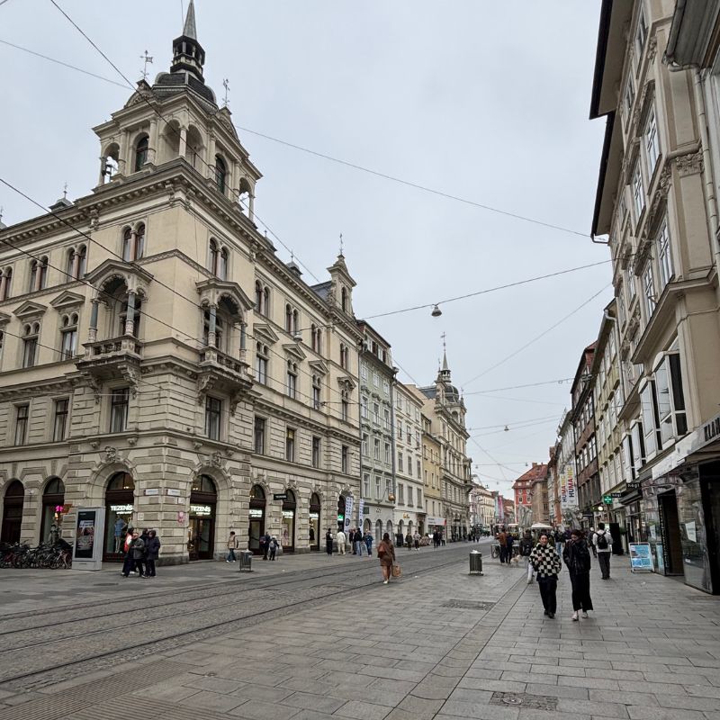 Historic buildings and tram tracks along Herrengasse in Graz's Old Town
