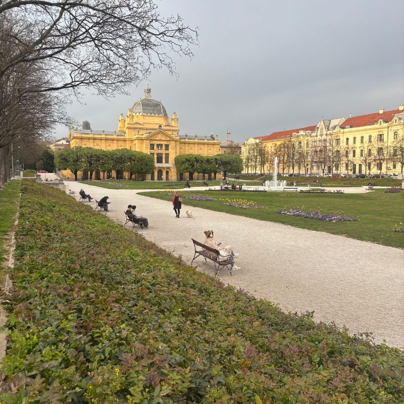 People enjoying a park near the Art Pavilion in central Zagreb, Croatia.