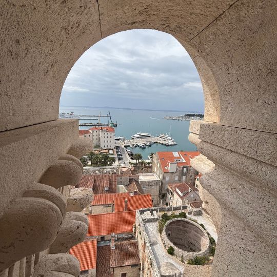 View over Split's rooftops and harbor from the bell tower of Saint Domnius Cathedral.