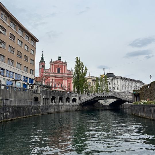 The Ljubljanica River flowing through central Ljubljana with bridges and historic architecture