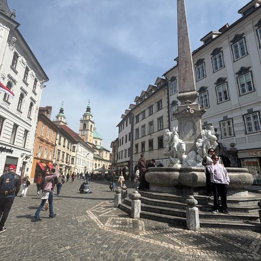 Prešeren Square in Ljubljana with historic buildings and the Franciscan Church.