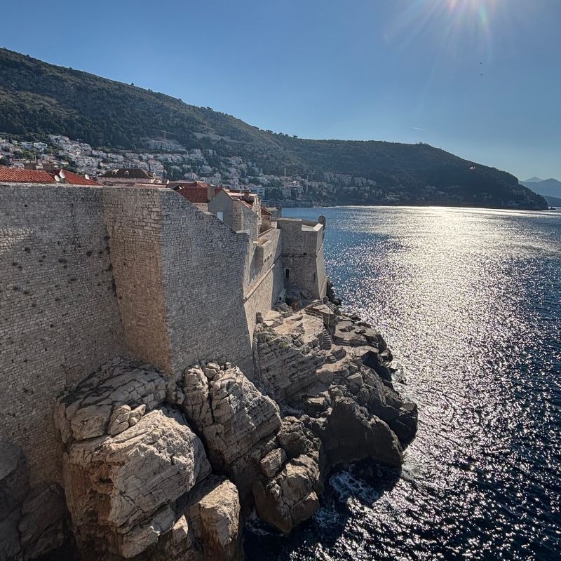 View of Dubrovnik's medieval city walls overlooking the Adriatic coastline