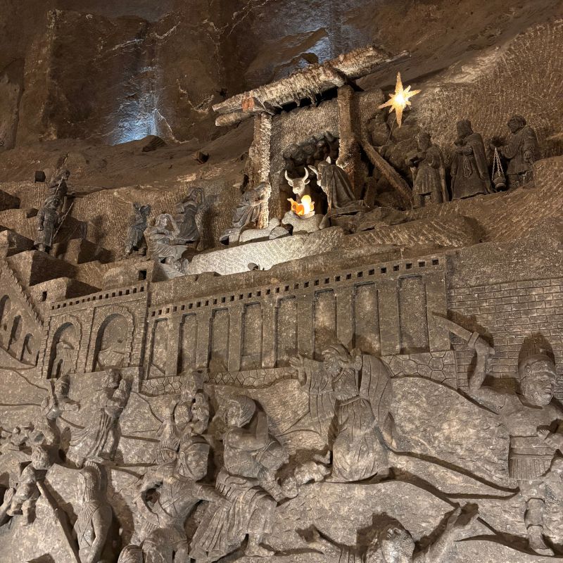 Intricate salt-carved religious scene inside the Wieliczka Salt Mine, highlighting the artistry created deep underground.