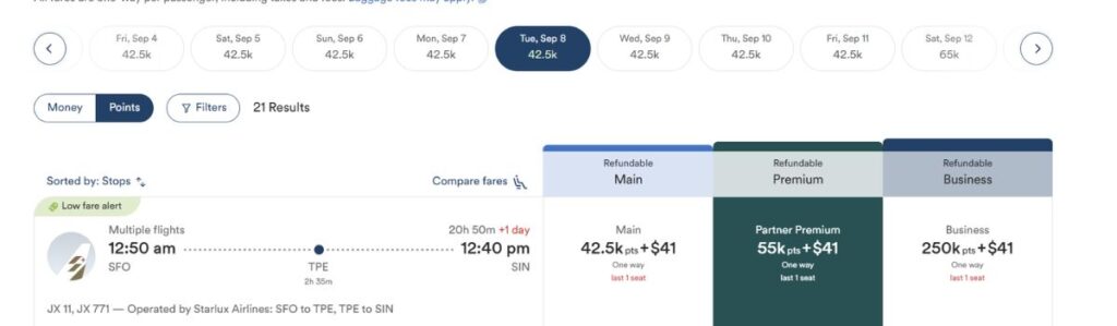 Atmos Partner Premium calendar showing a 55,000-point award to Singapore