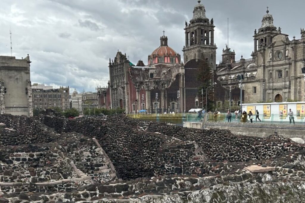 Ruins of Templo Mayor with Mexico City Metropolitan Cathedral in the background