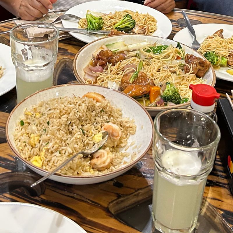 Chifa dishes including chaufa and noodles served for lunch in Lima’s Barrio Chino