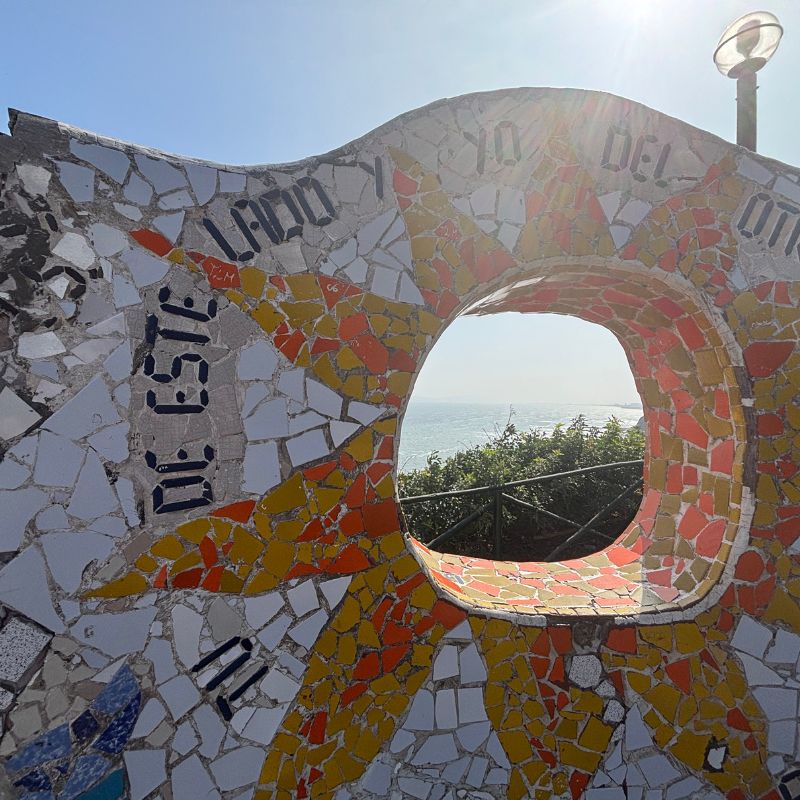 Colorful mosaic wall with an ocean view along the Malecón in Miraflores, Lima
